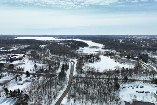 Acres of park with swimming, fishing, lighted trails, large playground, boat launch & picnicking.