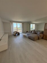 Building Photo - 10275 Collins Ave