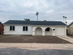 Building Photo - 1808 N 66th Ave