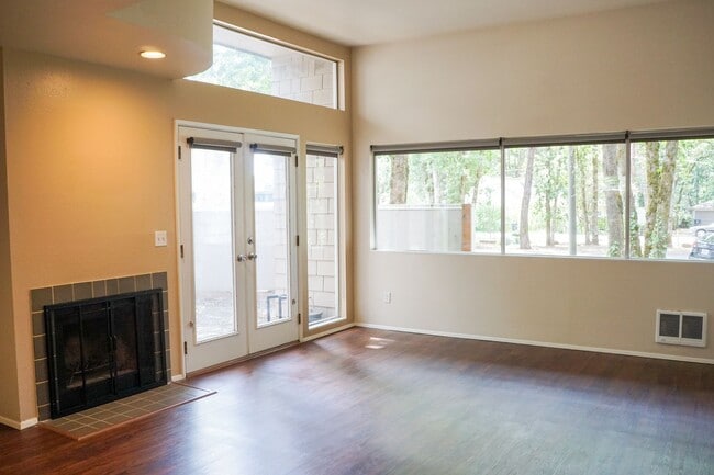 Building Photo - INCREDIBLE SPECIAL! Gorgeous & Bright 1-Bed w/ Wood-Burning Fireplace, W/D, & Private Patio!