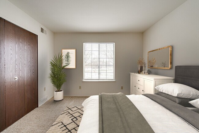 Dormitorio modelo con diseño Magnolia - Fox Pointe Apartments