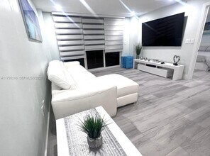 Building Photo - 6917 Collins Ave