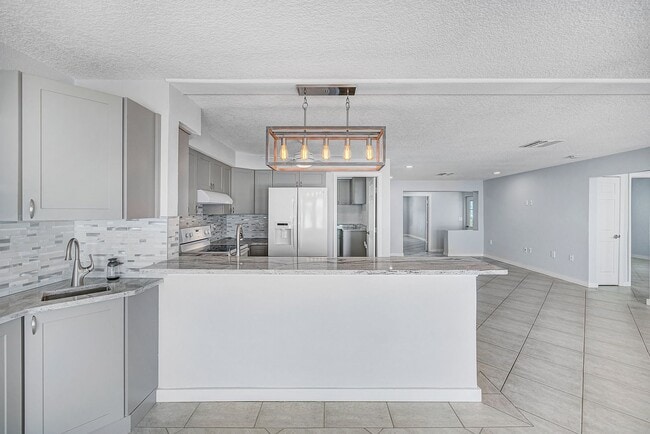 Building Photo - 3/2 Just Steps to the Intercoastal with Boat Ramp and Dock