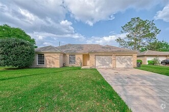 Building Photo - 1801 Laurel Oaks Dr