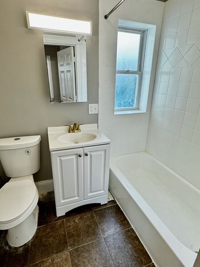 Building Photo - Full Luxury Renovation!  Laundry in Buildi...