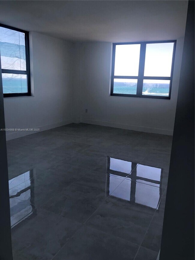 Building Photo - 10185 Collins Ave