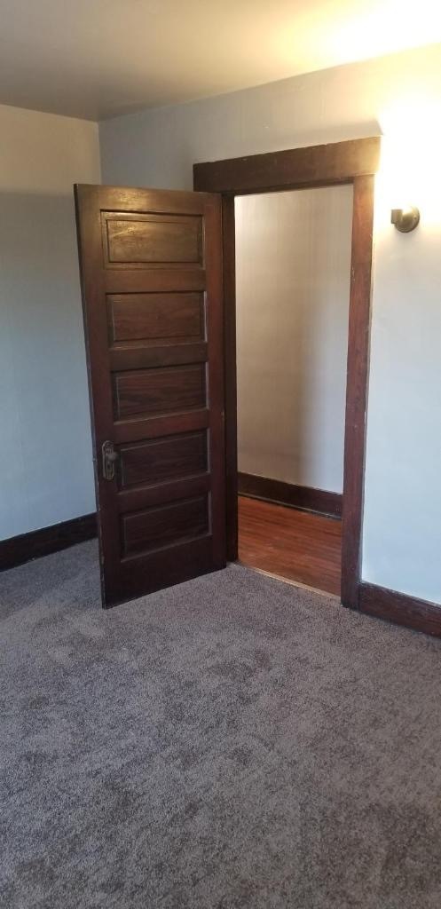 All three bedrooms have new paint and new carpet! - 215 N 19th St
