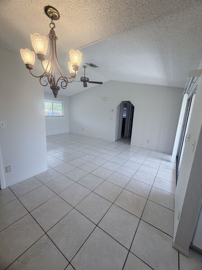 Building Photo - 1 MONTH FREE: Community Pool / All Tiled Unit with a screened in lanai / Water Included