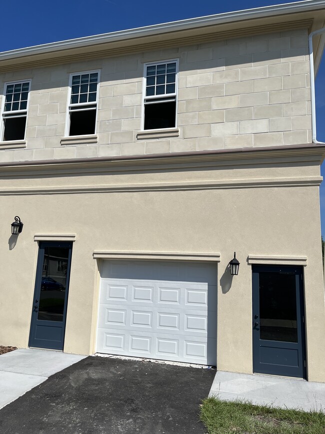 Garage and entry door to apartment - 8766 SW 27th Ln