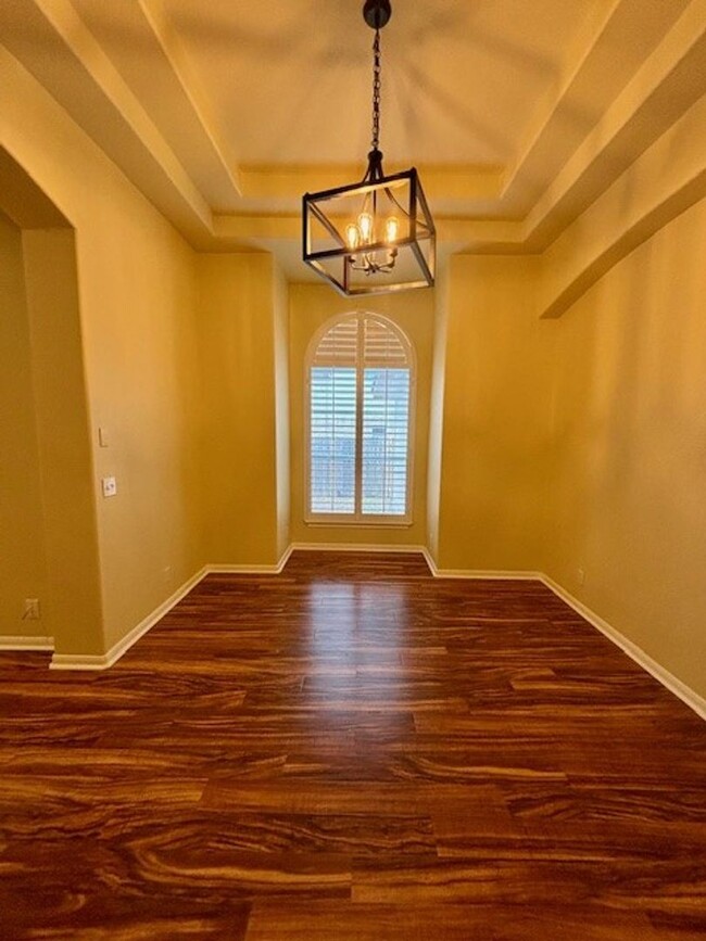 Building Photo - Cozy Highland Park Home WITH 3-CAR GARAGE ...