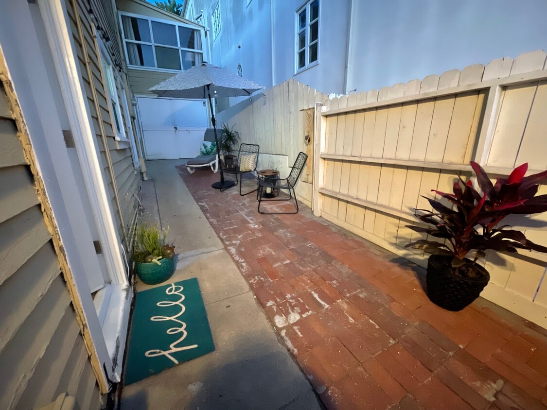 Front door with private small patio - 2452 Myrtle Ave