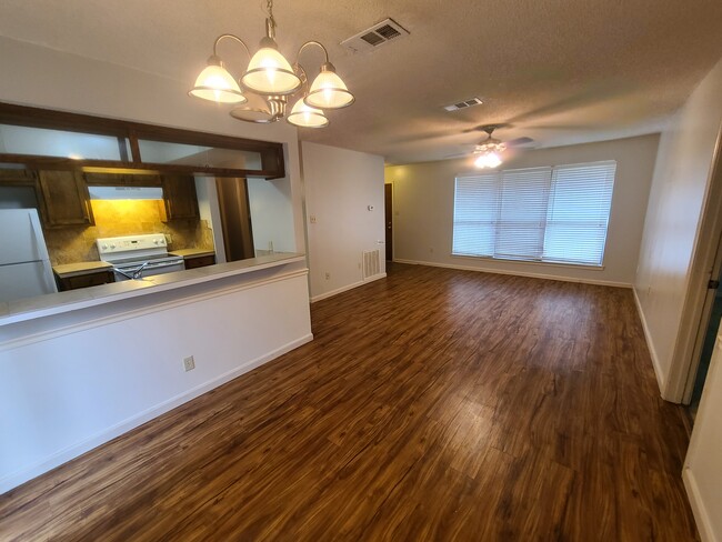 Open floor plan living room and dining area! - 1748 Port Dr