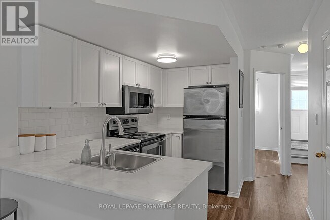 Photo du bâtiment - 60 Turntable Crescent