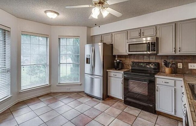 Building Photo - 9008 Topperwind Ct