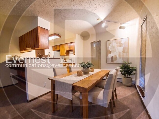 Building Photo - 2 Bed, 2 Bath Condo with Carport / Available Soon!