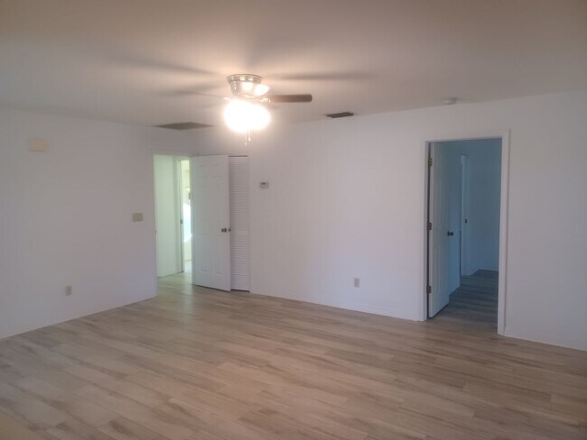 Building Photo - COMING SOON: Spacious Gulf Access 3 BR / 3 BA Home With a Large Screened Lanai for Entertaining &...