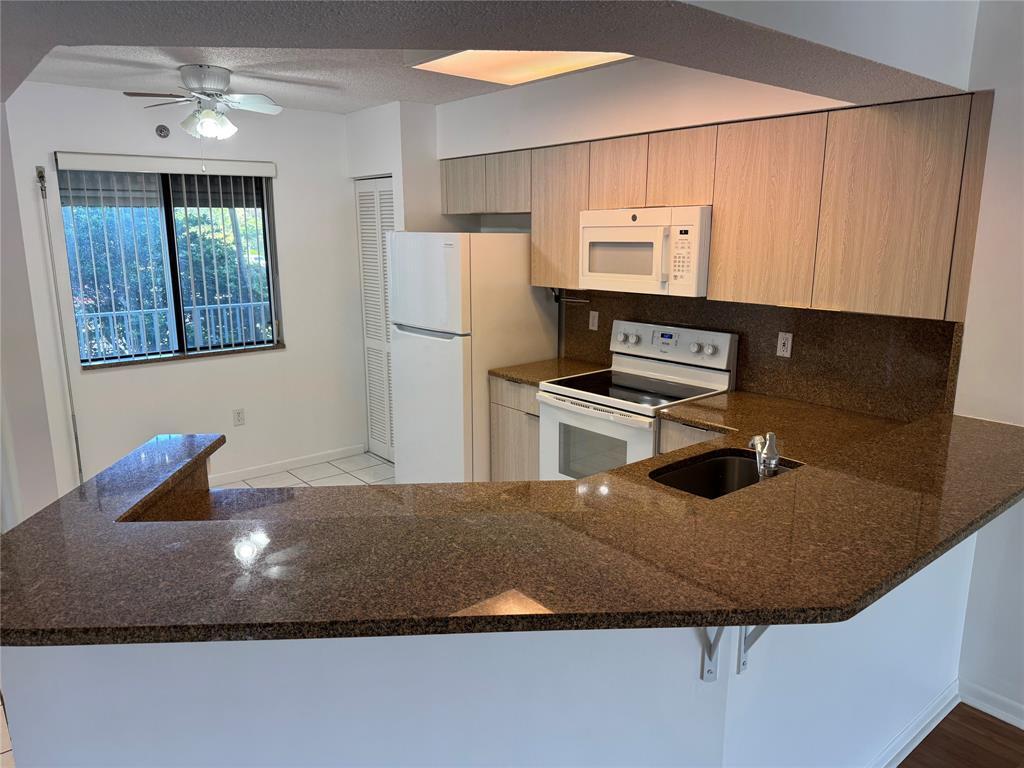Photo - 2334 South Cypress Bend Drive, Pompano Beach, FL 33069 - 3 BR 2 BA condo