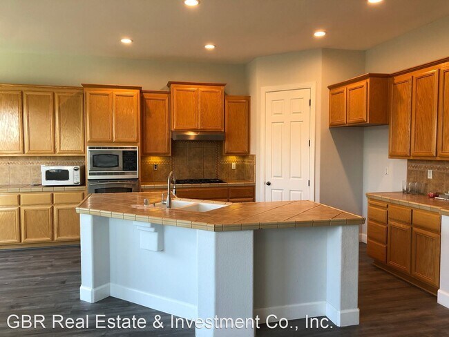 Building Photo - 4 br, 2.5 bath House - 8221 Cabochon Way