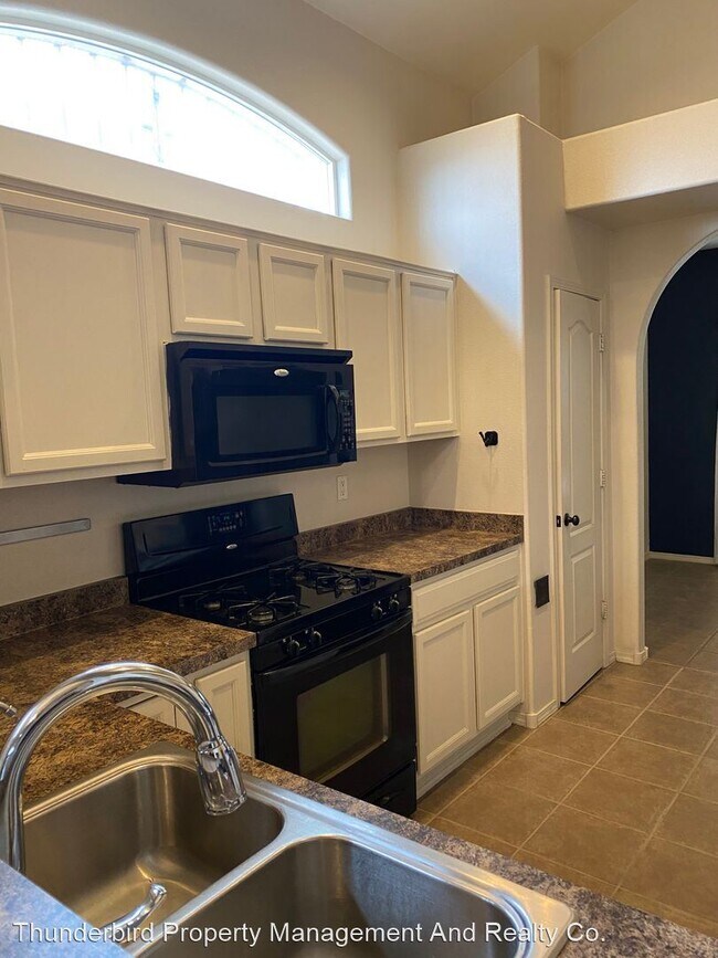 Building Photo - 3 br, 2.5 bath House - 9827 Sun Mountain T...