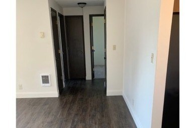 2bd 1ba hallway to bedrooms and full bathroom w/ vinyl plank flooring - Eagle Rock Apartments