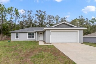 Building Photo - 10057 N Athenia Dr