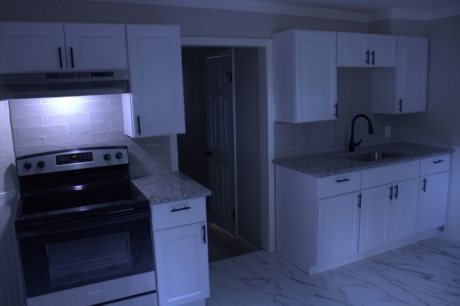 Building Photo - 9071 Tudor Ave