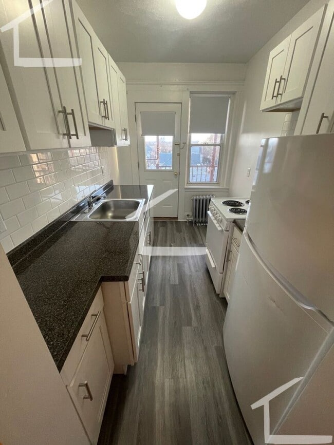 Photo - 9/1- No Fee! Large studio/small 1BR on Green Line in Brighton Apartment