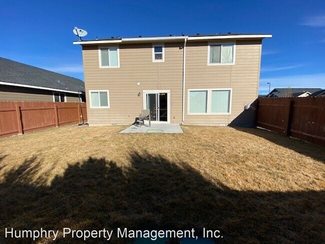 Building Photo - 4 br, 2.5 bath House - 9859 W. Littlewood St.