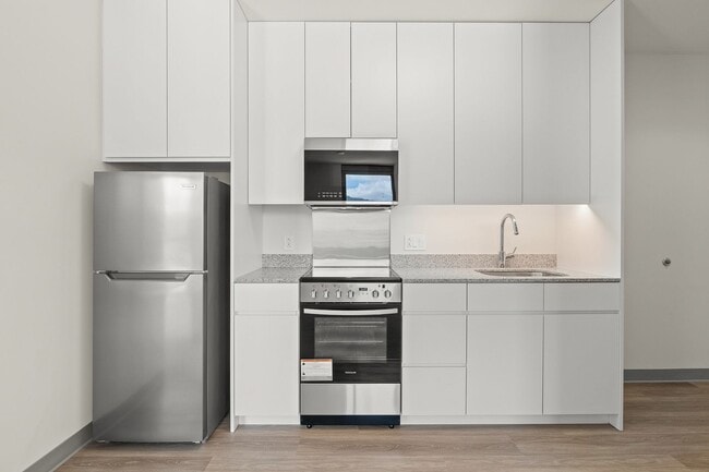 Building Photo - Brand New 2-bed/1-bath at The Flats at Sky...