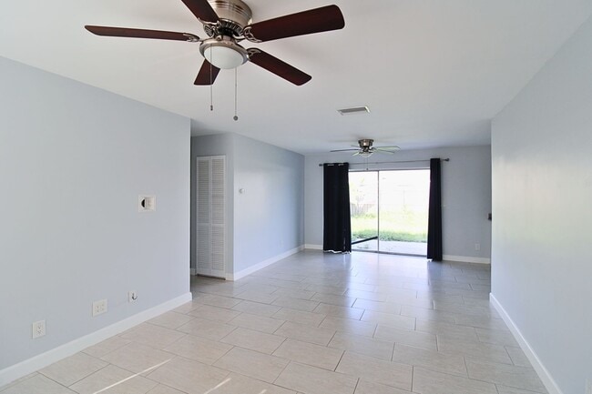 Photo - 3-Bed, 2-Bath Home with Spacious Fenced Yard in Pinellas Park!
