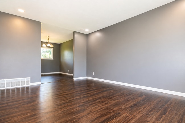 Building Photo - This charming 5-bedroom, 2-bathroom home is available for $2,000/month.