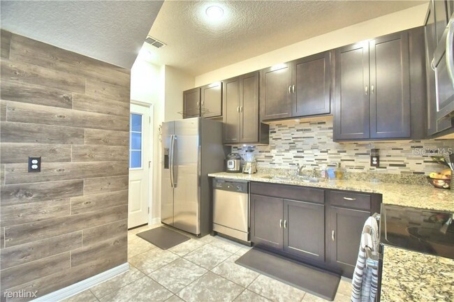 Building Photo - 4 br, 2 bath House - 2412 Seven Oaks Drive