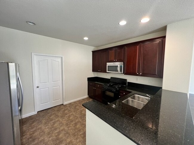 Foto del edificio - Four Bedroom South Reno Two Story Home with Washer/Dryer