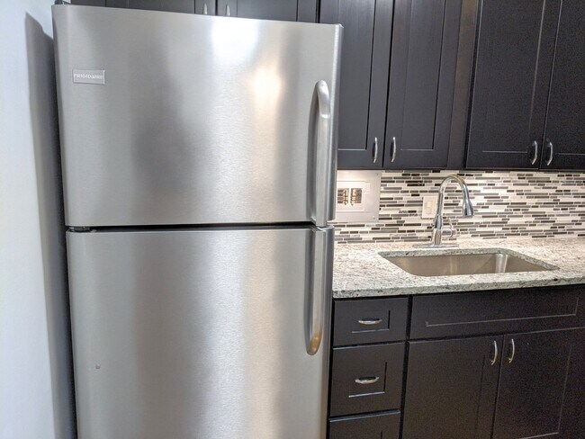Stainless steel fridge - 1516 Hinman Ave