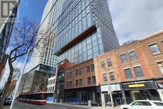 Building Photo - 100 Queen St E