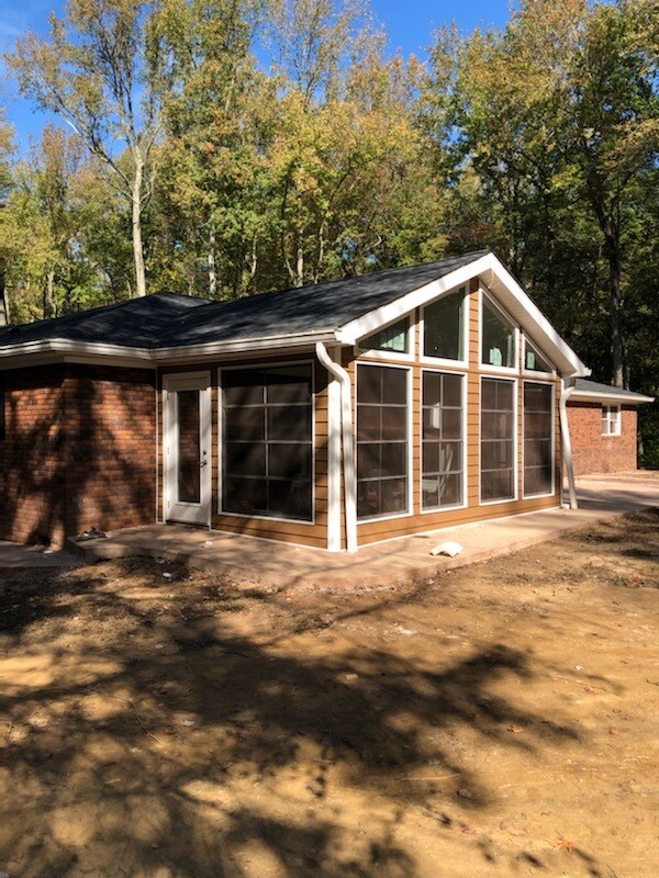 Three season room and back patio (stamped concrete) - 436 Blair Shore Rd