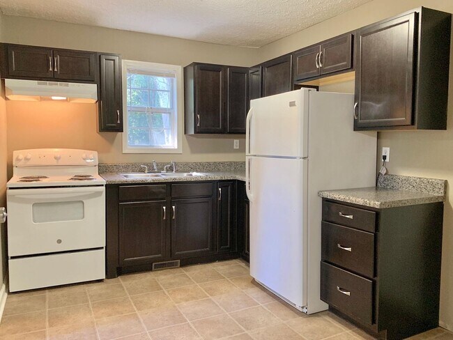 Building Photo - Pet-Friendly 2-Bedroom Home with Deck