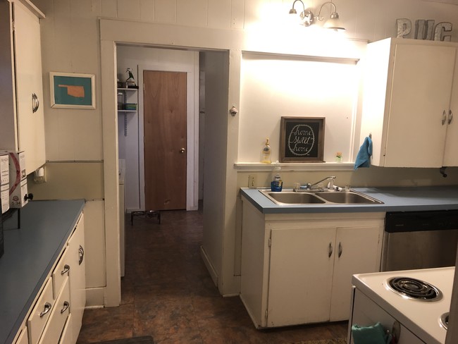 Kitchen into utility room - 707 S Monroe St