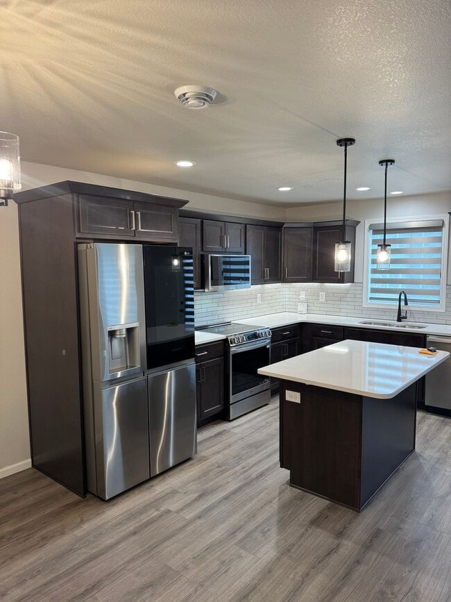 Building Photo - Modern 3-Bed Twinhome with Garage & Yard –...