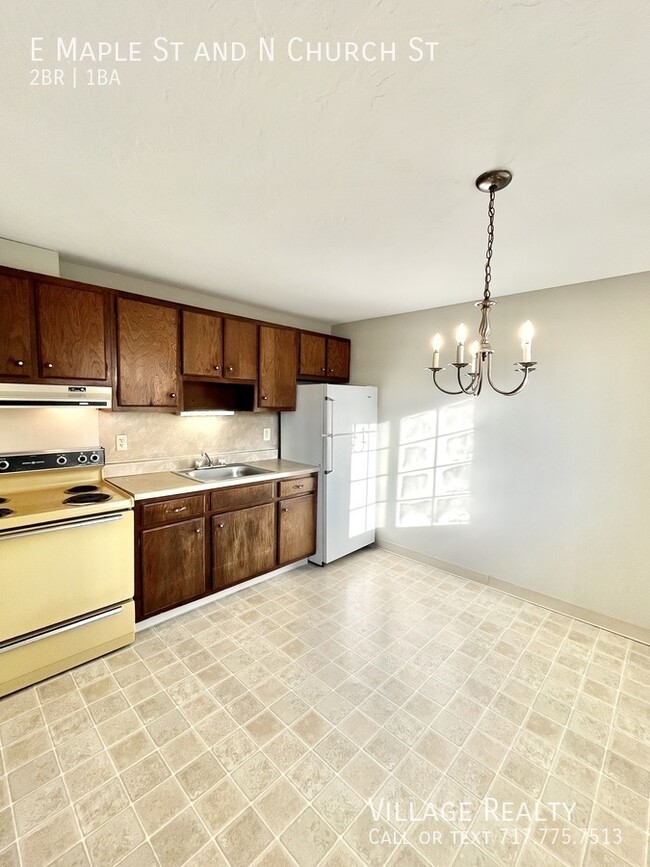 Building Photo - Affordably Priced 2-Bed with eat-in kitche...