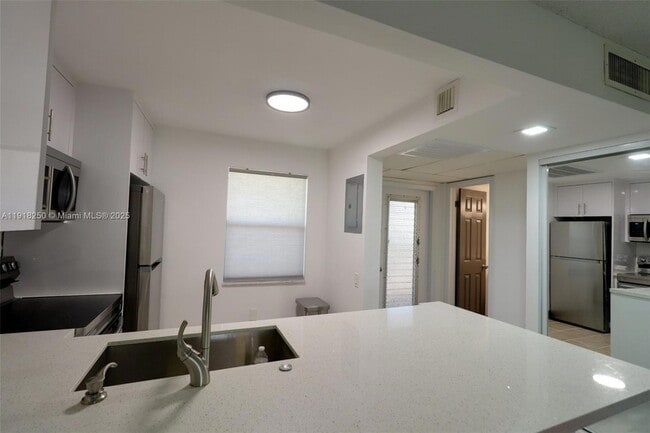 Photo - 9300 Lime Bay Blvd Apartment