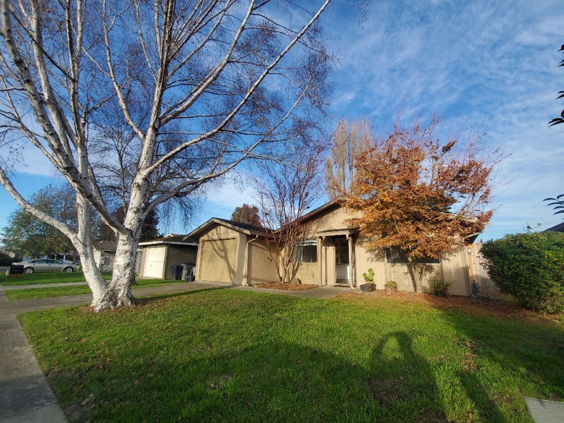 Primary Photo - 3-bedroom home with remodeled kitchen and ...