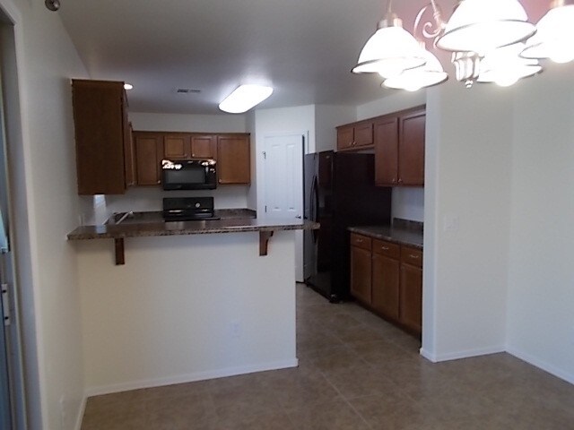 Building Photo - 7340 W Alicia Dr