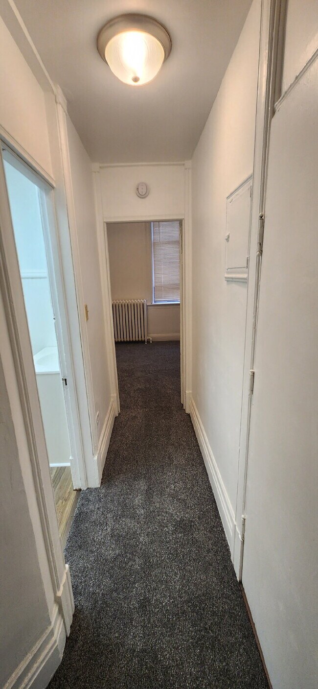 Foto del edificio - 119 E 3rd St