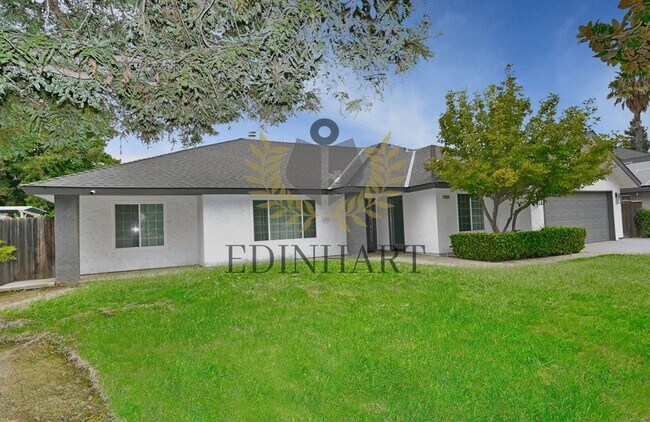 Building Photo - 7721 N Cedar Ave