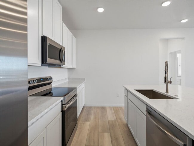 Building Photo - Bright, Modern 3-Bedroom Home with Main-Floor Living in Gateway Commons
