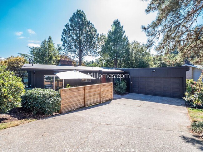 Building Photo - Discover Charm Mid-Century Modern Home In ...