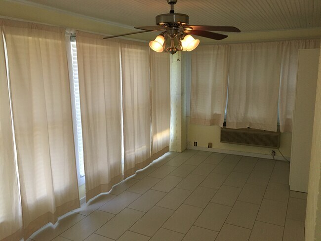 Bedroom Main Floor. Room has personal heater and air conditioner. (Empty) - 1304 Dunklin St