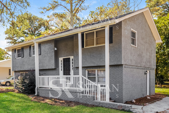 Building Photo - Welcome to this charming abode.