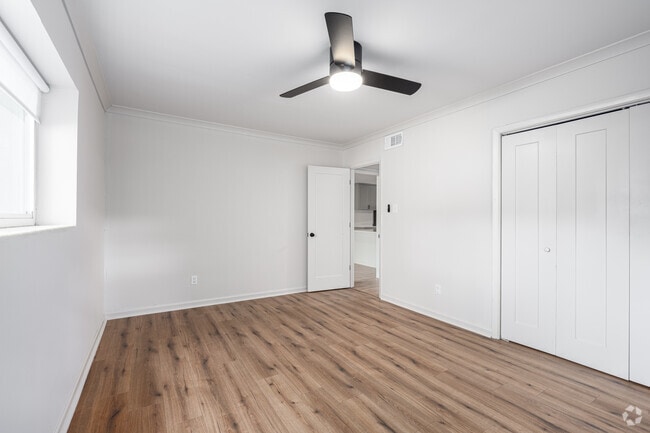 2BR, 1BA - 1,100SF - Primary Bedroom - Woodland Apartments